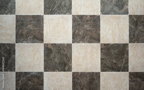 Schilderij op canvas Gray and Beige Chequered Stone Tile Surface with Textured Patterns