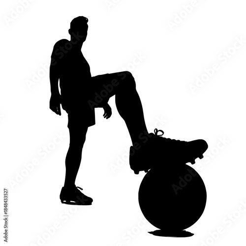 Soccer player in silhouette standing with foot on ball, ready to play