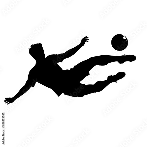 Dramatic silhouette of a soccer player performing a bicycle kick