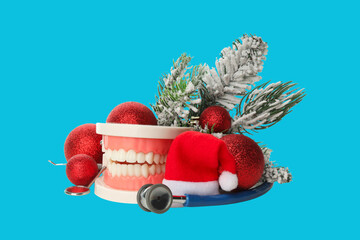 Fotobehang Tandarts Tandmodel met kerstdecoratie en instrumenten  © Atlas