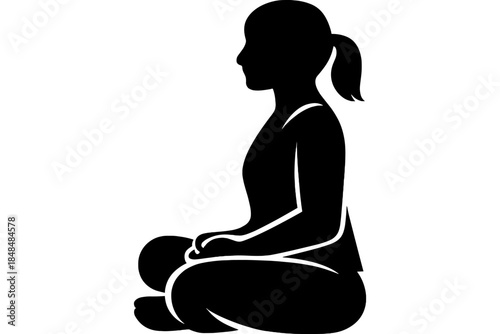 Silhouette of a woman meditating in sitting pose for yoga and mindfulness