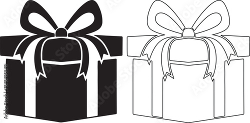 Black and white gift boxes with ribbons on top