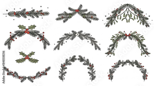 Christmas and winter holiday decorative elements festive fir branches and holly with berries isolated on white background