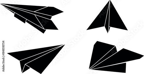Four paper airplanes in various styles