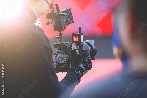 Canvastavla Video recording activities by on-stage photographers at sporting events