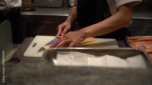 Japanese chef making a sushi