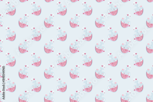 Seamless pattern of pink potion bottles with heart stoppers and floating hearts on a soft blue background. Cute romantic design ideal for wrapping paper, textiles, stationery, party decor