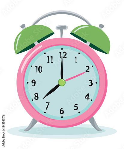 Classic pink analog alarm clock with green bells for morning wake up routine and daily time management