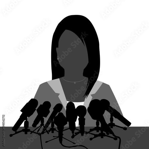 Speaker woman giving an interview at a press conference with many microphones.eps