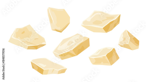An assortment of freshly cut creamy yellow dairy blocks, depicting various irregular shapes and sizes, scattered across a pristine white background.