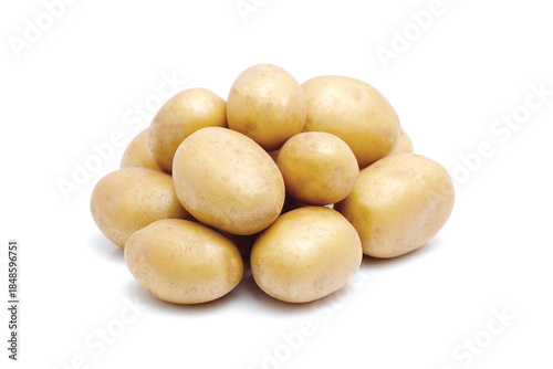 Heap of raw baby potatoes on white background