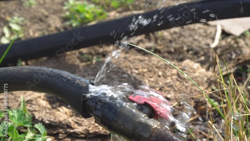 Water leakage at the connection point of the hose to the pipe. Due to the leakage, water splashes around. Wasteful use of resources