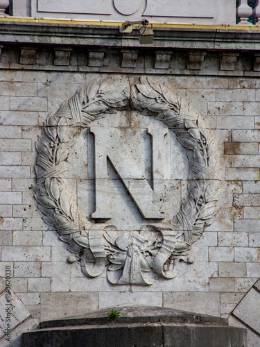 Stone Carving of the Letter N With Laurel Wreath on Building Facade in Paris