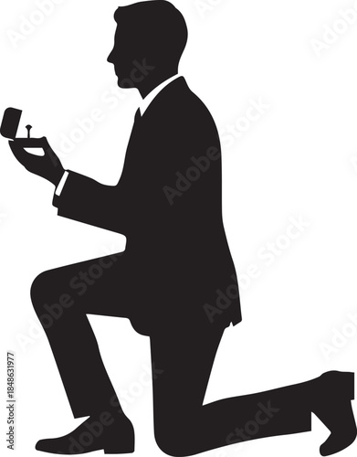 Silhouette of a man proposing on one knee with a ring