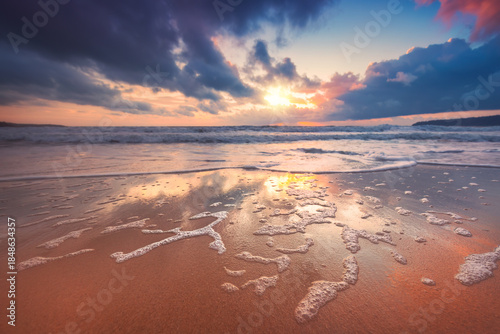 Fototapeta Naklejka Na Ścianę i Meble -  Beach sunrise over the tropical sea shore, ocean beach sunset landscape