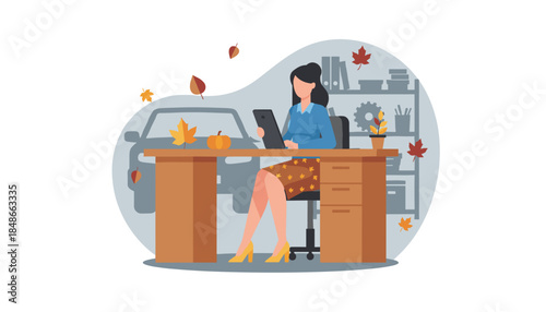 Woman uses tablet at office desk surrounded by autumn leaves and pumpkin decoration