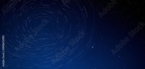 Swirling cosmic patterns and countless stars illuminate the tranquil, expansive night sky,  mystical,  space