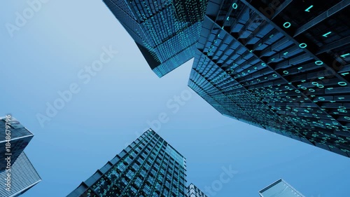 Low Angle View of Futuristic Glass Skyscrapers with Blue Light Effects