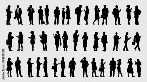 Diverse group of business people silhouettes standing and interacting with mobile devices and each other