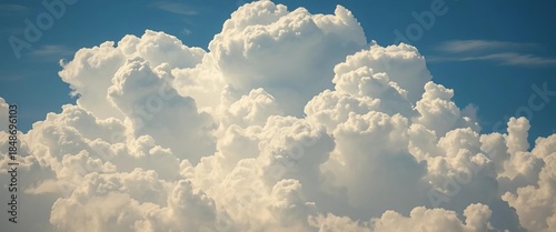 Dense cumulus cloudscape, dramatic light and shadow,   artwork,  blue