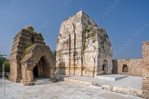 Morning landscape view of ancient stone temples at Katas Raj hindu Shiva temple complex, Chakwal, Punjab, Pakistan