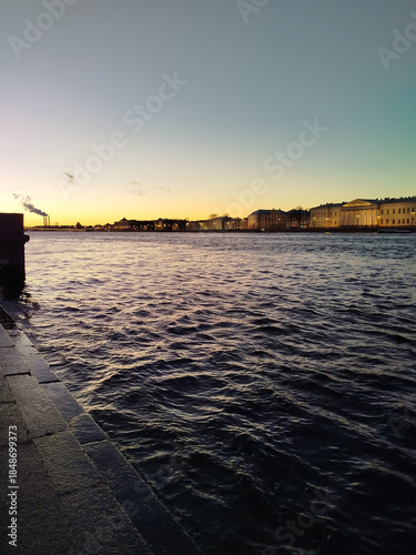 Sunset view by the water in the city