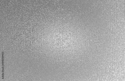 High resolution silver metallic embossed abstract texture featuring reflective surface details and soft gradient shading ideal for modern graphic design and branding