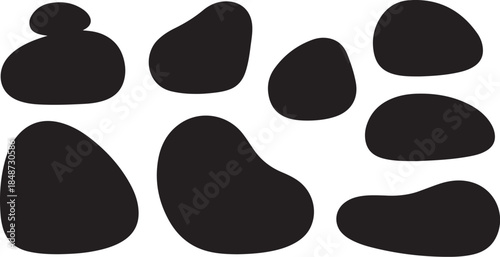 Black organic shapes on a white background