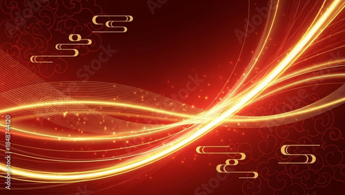 Golden light trails swirling in abstract motion on dark background with glowing lines and sparks