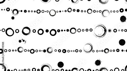Abstract seamless pattern with black circles and ink blots on a white background