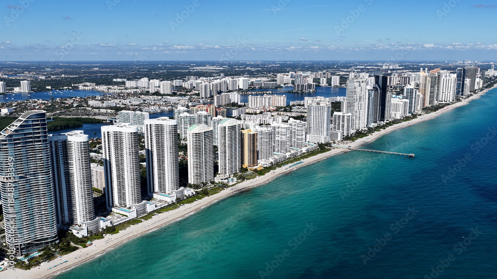 Fototapeta premium Sunny Isles Skyline At Sunny Isles Beach In Florida United States. Stunning Cityscape. Beach Landscape. Highrise Buildings. Sunny Isles Skyline At Sunny Isles Beach In Florida. Nature Background.