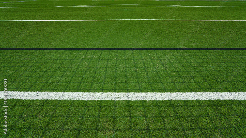 Obraz premium textured soccer game field - shadows from the soccer net