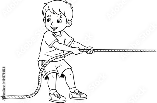 A young boy pulling a rope with a smile on his face and a determined look in his eyes very focused