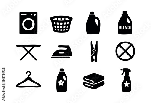 A comprehensive set of black silhouette icons depicting various laundry and household cleaning items and symbols on a white background — stock vector.
