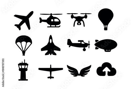 A collection of black silhouette icons depicting various forms of aviation, flight, and air transport elements on a white background — stock vector.