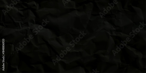 crumpled black paper. Crumpled black paper texture background. 