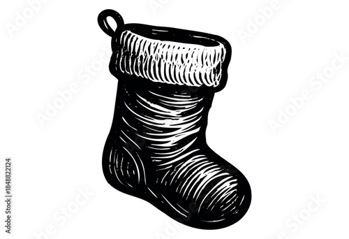 A black and white woodcut style illustration of a single Christmas stocking with a textured cuff and body, isolated on a white background.