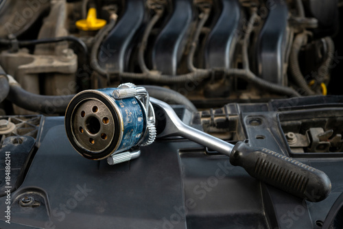Filter removal wrench with old oil filter