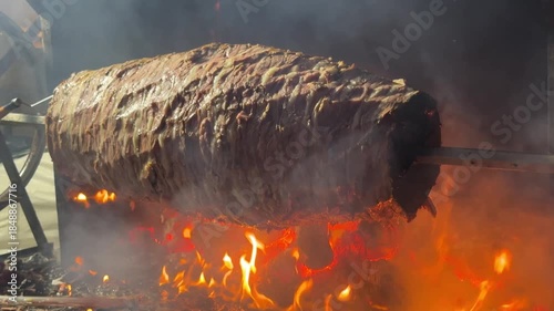 Doner Kebab Traditional Turkish Food Cag Kebabi. Rolling lamb meat doner kebab