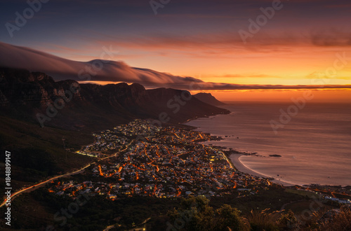 The sunset view point on the Lion head trail with a city light view on Capetown 