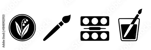 Black set with paintbrush watercolor palette and lily flower isolated white background