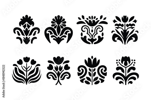 Set of 8 black floral ornaments and decorative elements, isolated on white background