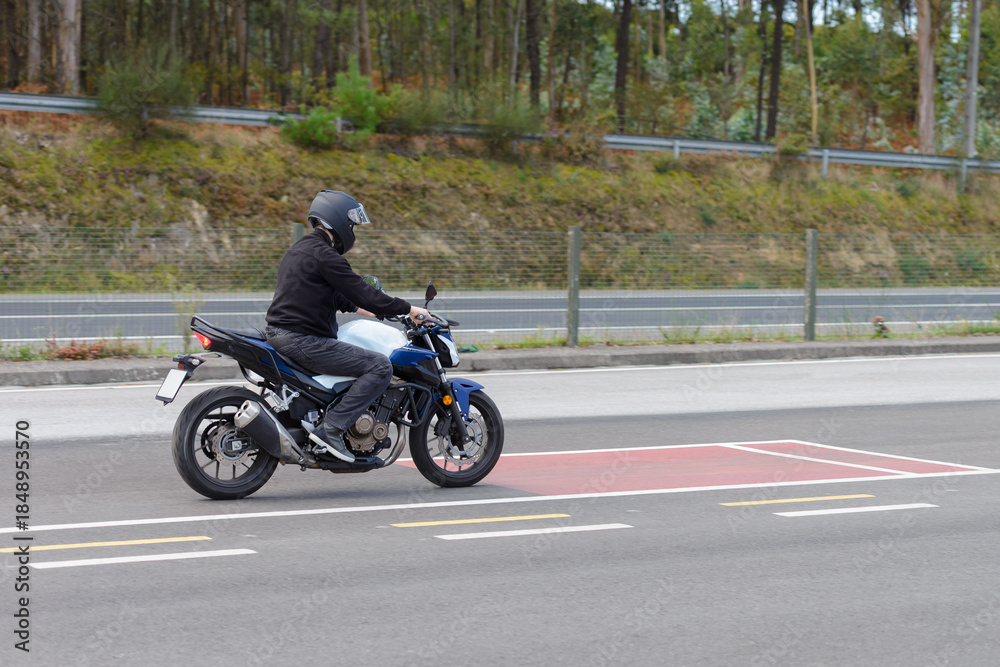 Fototapeta premium training in a motorcycle school, training in motorcycle control skills