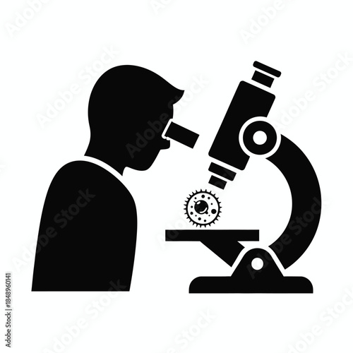 Scientist examining sample under microscope
