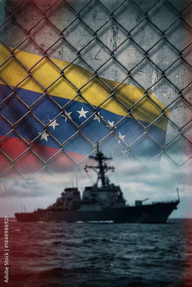 Obraz premium Venezuelan flag behind chain link fence with military naval warship on ocean symbolizing naval blockade maritime restriction conflict sanctions barrier geopolitical tension