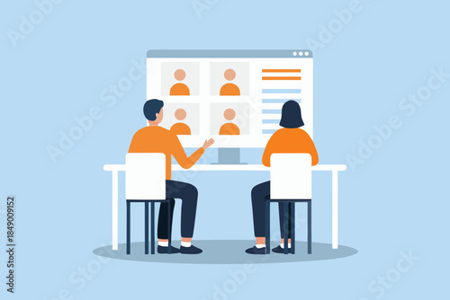 People participating in a virtual meeting viewed on a laptop screen