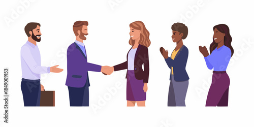 Successful business team celebrating a deal with a firm handshake