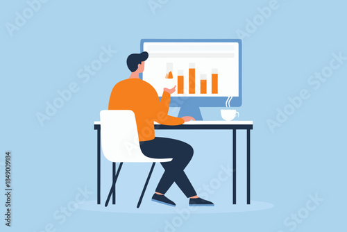 Man analyzing data charts on computer working at a modern desk