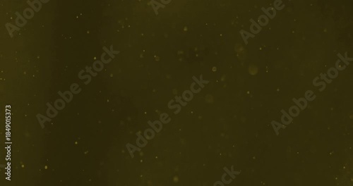 golden glittering christmas background floating with bokeh, gold holiday happy new year