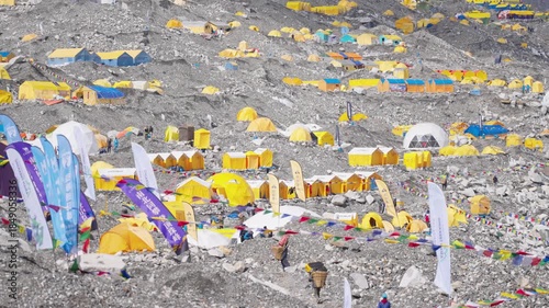 Everest Base Camp Colorful Tents and Climbers in Himalayas
